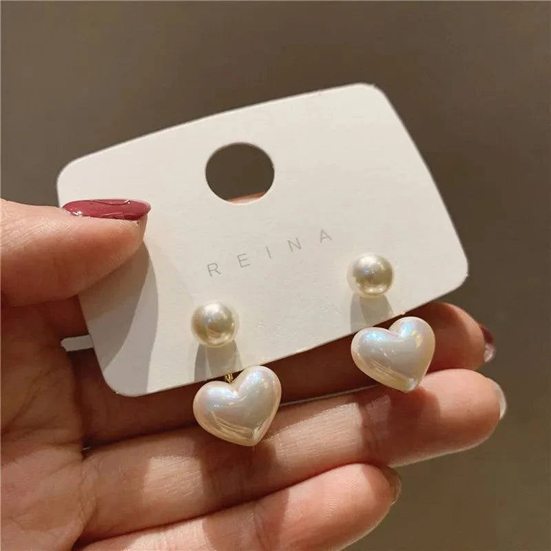 Heart Pearl Drop Earrings 💖✨Add a touch of romance and elegance to your look with our Heart Pearl Drop Earrings - a charming and timeless accessory that complements your style with grace and beSHOP ALL I WANTShop All I WantHeart Pearl Drop Earrings