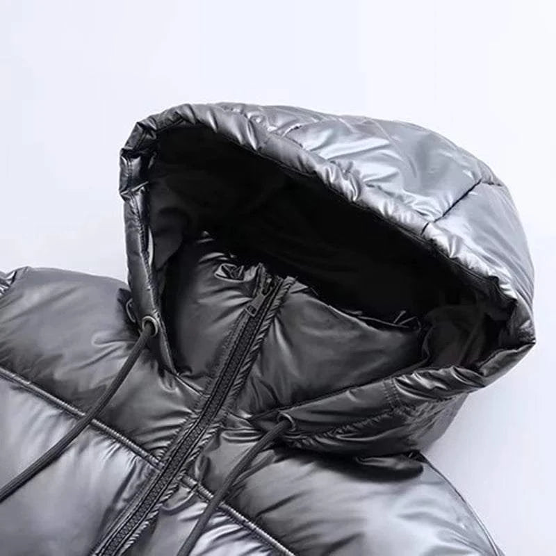 Elegant Hooded Winter JacketStay warm in style with this elegant down vest. Its cozy design combines warmth with a touch of sophistication for a chic look. 🌟🧥SHOP ALL I WANTShop All I WantElegant Hooded Winter Jacket