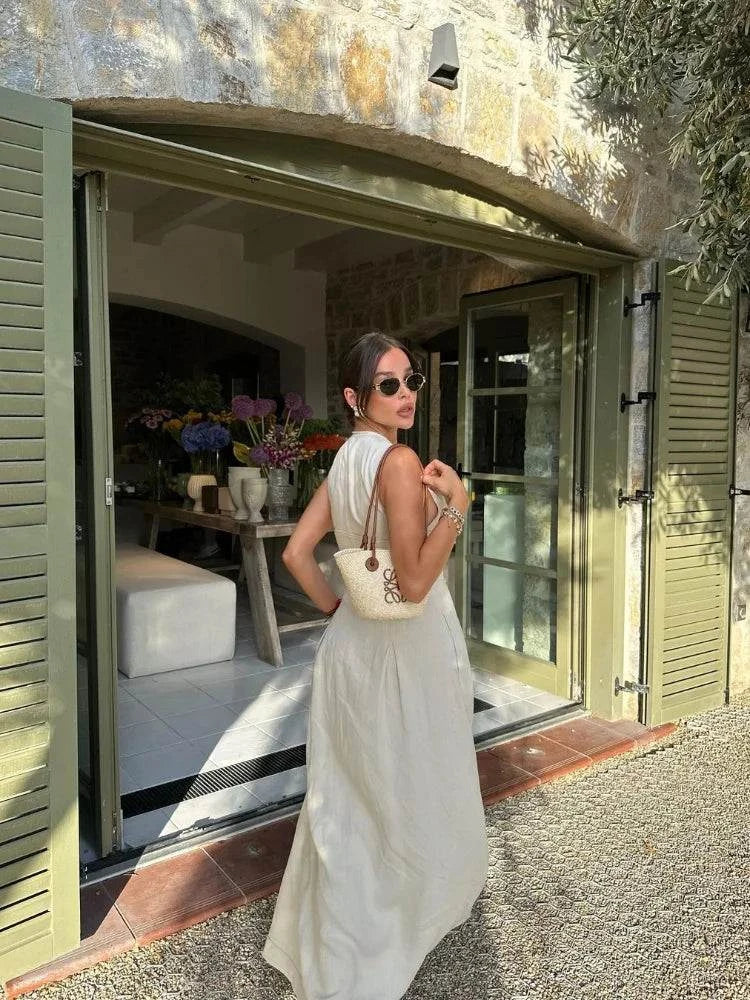 Sleeveless High Waist Maxi DressStep into summer with effortless elegance in the Chic V-Neck Sleeveless Maxi Dress. This stunning ankle-length dress features a flattering A-line silhouette with a VSHOP ALL I WANTShop All I WantSleeveless High Waist Maxi Dress