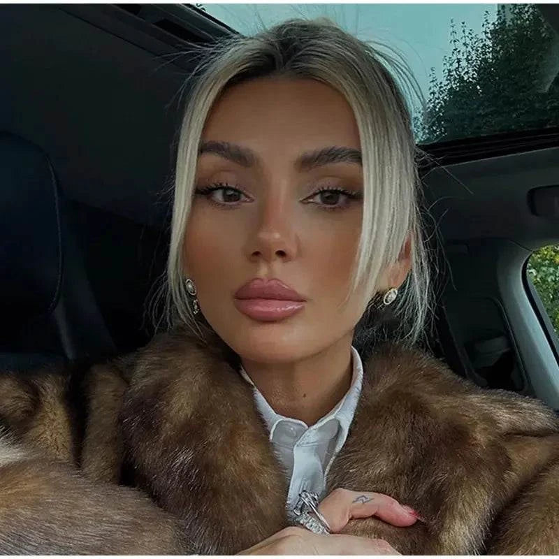 Women’s Dark Brown Faux Fur Overcoat: Plush & Warm Trench! ❄️🧥Stay cozy and stylish this winter with our women's dark brown faux fur long overcoat. This single-breasted fleece trench coat combines luxury and warmth, featuring aShop All I WantShop All I WantWomen’s Dark