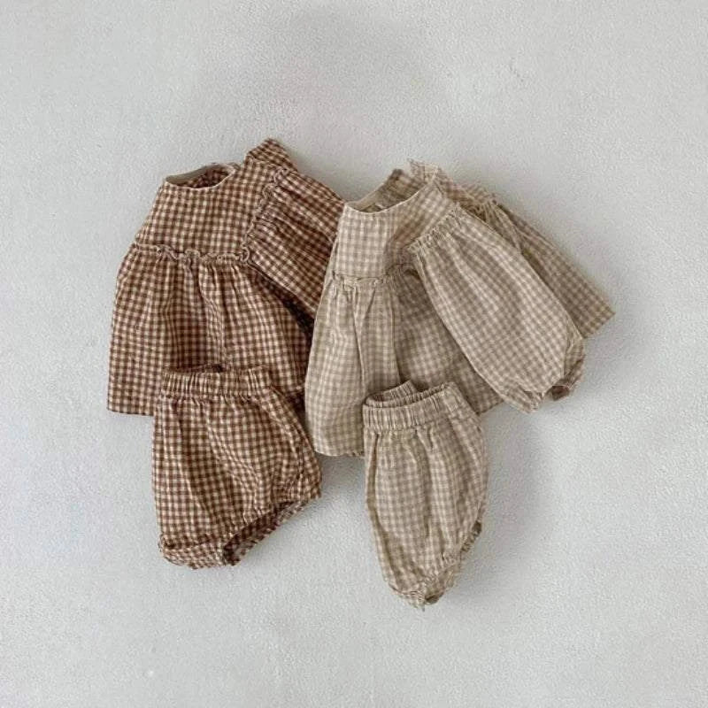 Comfy & Cute: Baby Outfits for Every Occasion! 🧸Keep your baby girl stylish and comfortable with this adorable Summer Plaid Blouse and Shorts Set. Made from 100% cotton, it's perfect for warm weather and availableSHOP ALL I WANTShop All I WantComfy & Cute Baby Outfits