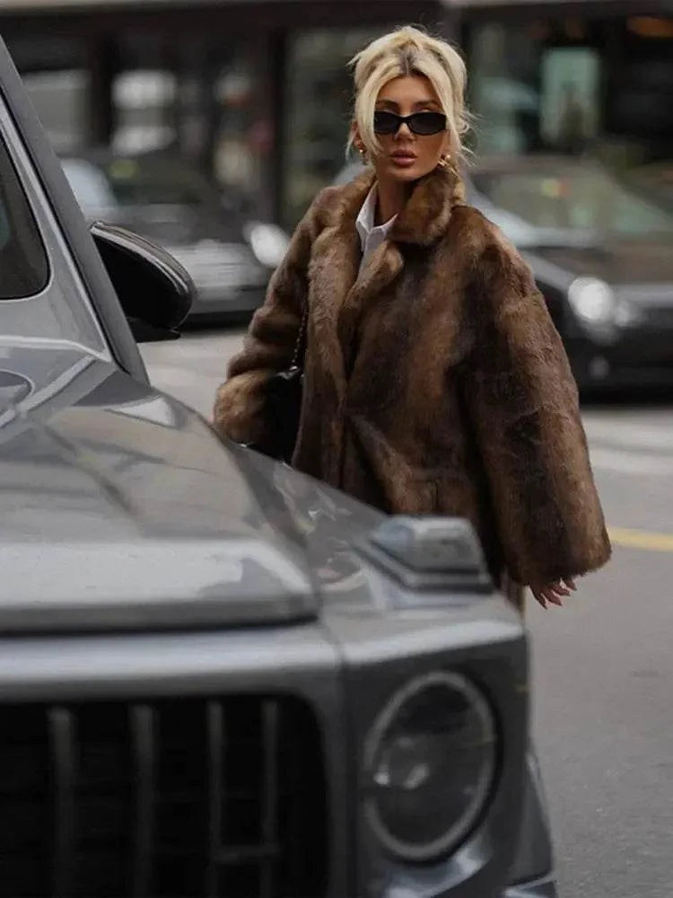 Women’s Dark Brown Faux Fur Overcoat: Plush & Warm Trench! ❄️🧥Stay cozy and stylish this winter with our women's dark brown faux fur long overcoat. This single-breasted fleece trench coat combines luxury and warmth, featuring aShop All I WantShop All I WantWomen’s Dark