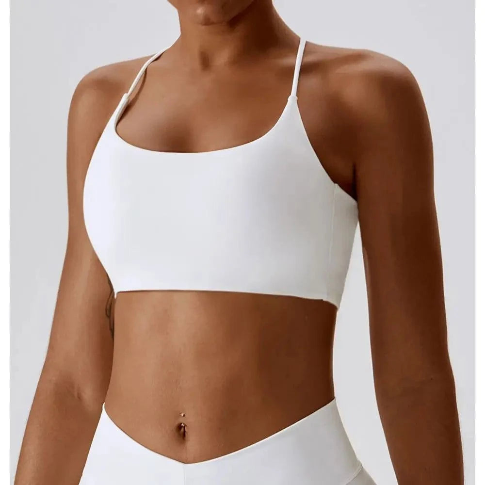 Solid Color Cross Back Sports Bra πποΈββοΈ #FitnessStyleRevolutionize your workout wardrobe with our Solid Color Cross Back Sports Bra β a perfect blend of style and support designed for the modern fitness enthusiast. WitSHOP ALL I WANTShop All I WantSolid Color Cross Back Sports Bra