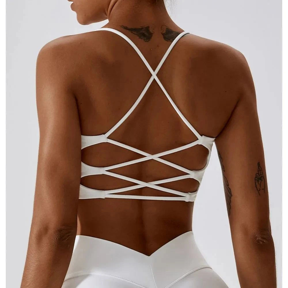 Solid Color Cross Back Sports Bra πποΈββοΈ #FitnessStyleRevolutionize your workout wardrobe with our Solid Color Cross Back Sports Bra β a perfect blend of style and support designed for the modern fitness enthusiast. WitSHOP ALL I WANTShop All I WantSolid Color Cross Back Sports Bra