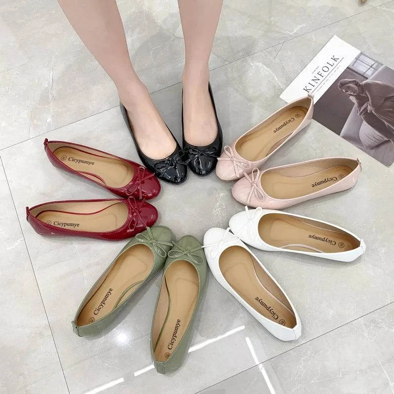 Round Toe Bowtie BallerinasStep out in style with these chic ballet flats, adorned with a cute butterfly-knot detail. Crafted from durable PU with a soft PU insole, these slip-on flats are perSHOP ALL I WANTShop All I WantRound Toe Bowtie Ballerinas