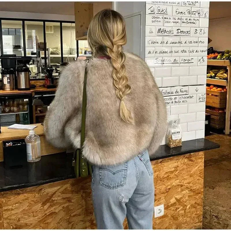 Shop All I WantElegant Fluffy Faux Fur Coat ❄️✨Elevate your winter wardrobe with the Fashion Fluffy Faux Fur Coat for Women, designed for both elegance and comfort. This luxurious coat features a loose fit and loShop All I WantShop All I WantWomen – Luxury Winter Jacket & High Street Outerwear ❄️✨