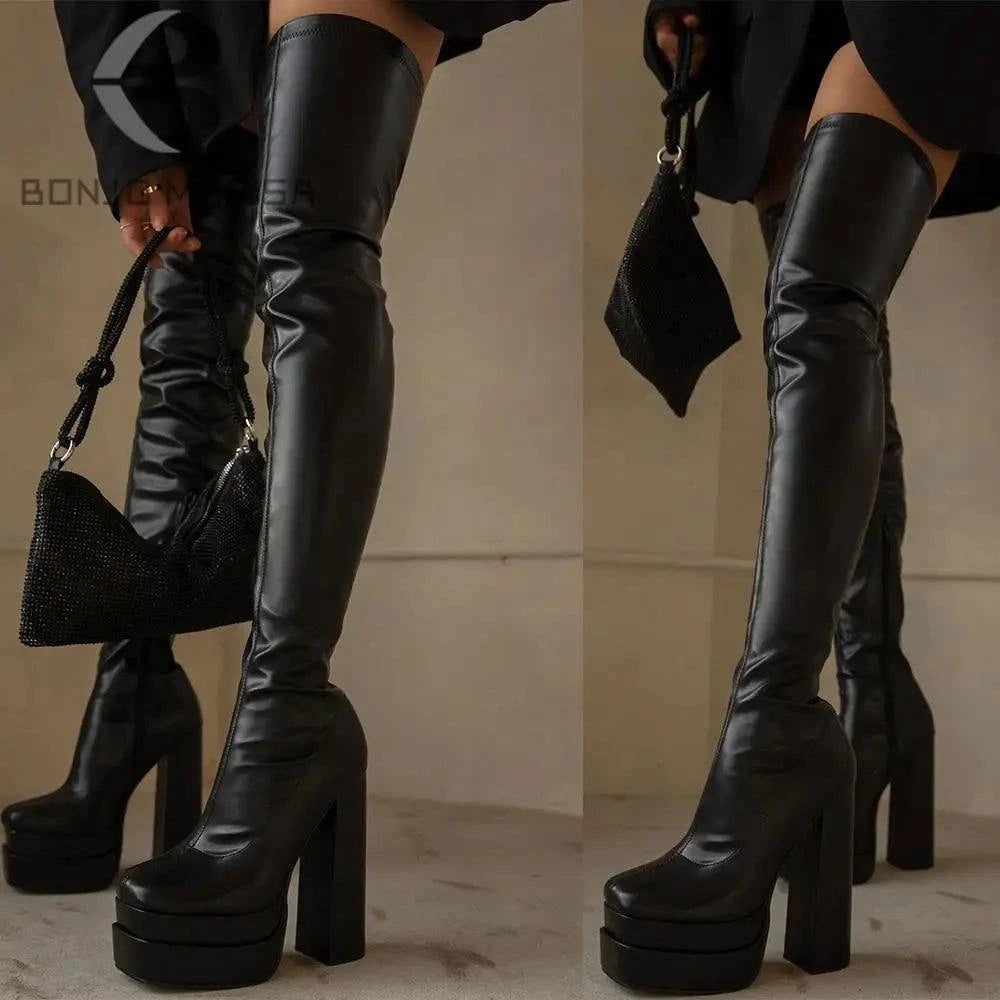Thigh High Block Heel BootsOver-the-Knee Platform High Heel Boots. Combining modern punk style with practical comfort, these boots feature a super high heel and platform for added height. MadeSHOP ALL I WANTShop All I WantThigh High Block Heel Boots
