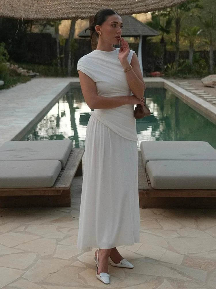 Elegant White Bodycon DressMake a statement with this elegant white bodycon dress. Its sleek, form-fitting design exudes sophistication and style. 👗✨SHOP ALL I WANTShop All I WantElegant White Bodycon Dress