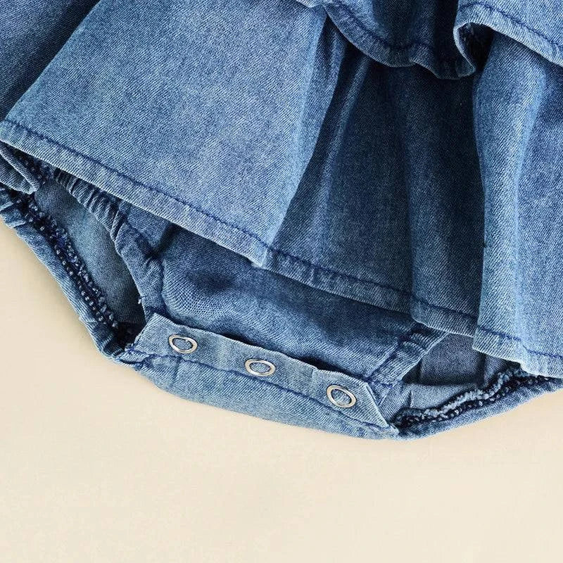 Baby Summer Denim Romper – Sleeveless, Ruffle Hem, Suspender Design wiDress your little one in style with this Baby Summer Denim Romper. Featuring a sleeveless design, ruffle hem, and a suspender style with snap buttons, this cute jumpShop All I WantShop All I WantBaby Summer Denim