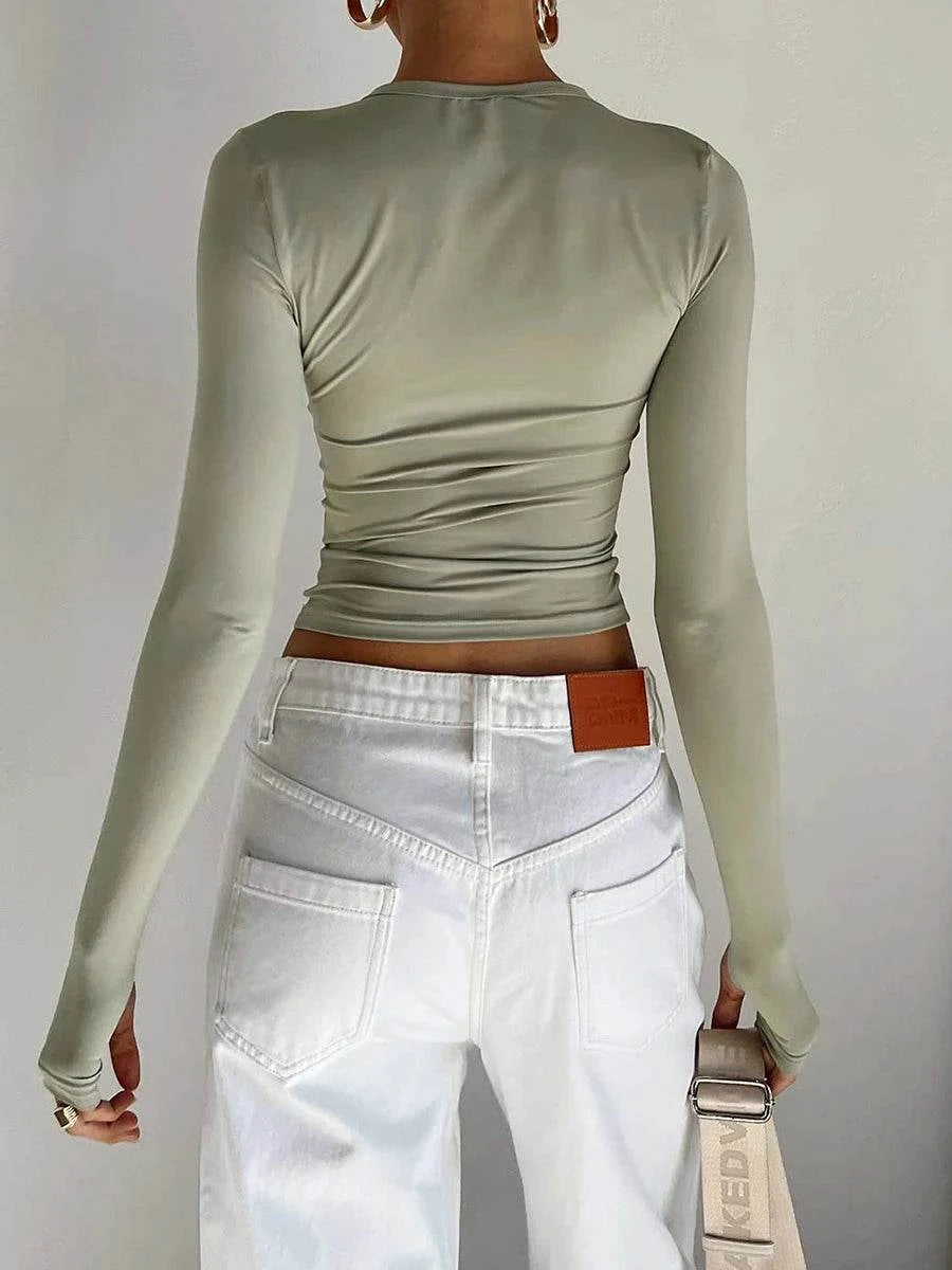 Slim Fit Long Sleeve Crop TopElevate your casual look with the Chic Long Sleeve Crew Neck Crop Top. Designed for the modern woman, this slim-fit tee features a trendy crew neck and convenient thSHOP ALL I WANTShop All I WantSlim Fit Long Sleeve Crop Top