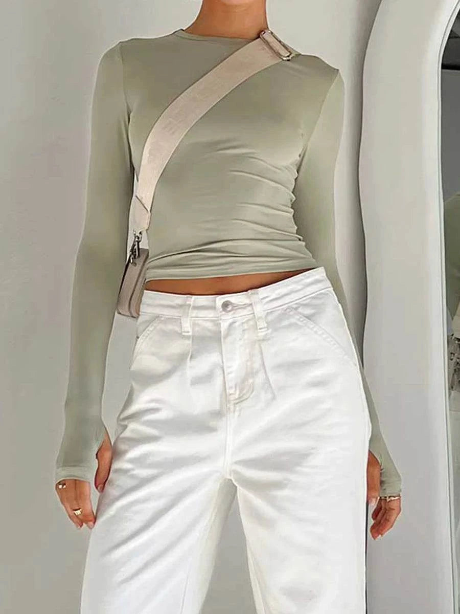 Slim Fit Long Sleeve Crop TopElevate your casual look with the Chic Long Sleeve Crew Neck Crop Top. Designed for the modern woman, this slim-fit tee features a trendy crew neck and convenient thSHOP ALL I WANTShop All I WantSlim Fit Long Sleeve Crop Top