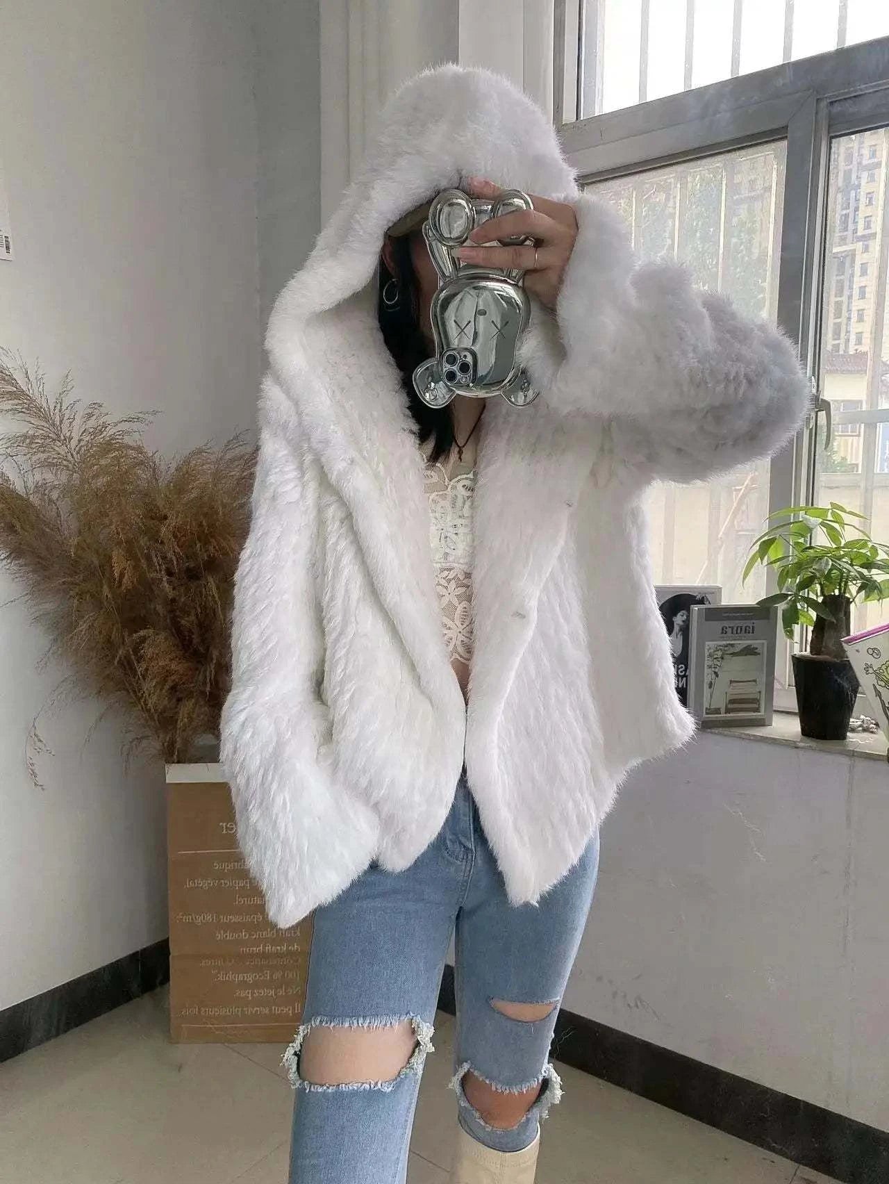 Real Rabbit Fur Coat -Miami stylish warmth 🌴Embrace winter in style with the AnnSirGra Real Rabbit Fur Coat. Featuring 100% genuine rabbit fur with a chic flare sleeve and hood, this coat combines warmth with SHOP ALL I WANTShop All I WantReal Rabbit Fur Coat