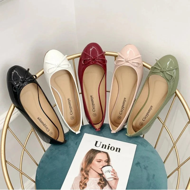 Round Toe Bowtie BallerinasStep out in style with these chic ballet flats, adorned with a cute butterfly-knot detail. Crafted from durable PU with a soft PU insole, these slip-on flats are perSHOP ALL I WANTShop All I WantRound Toe Bowtie Ballerinas