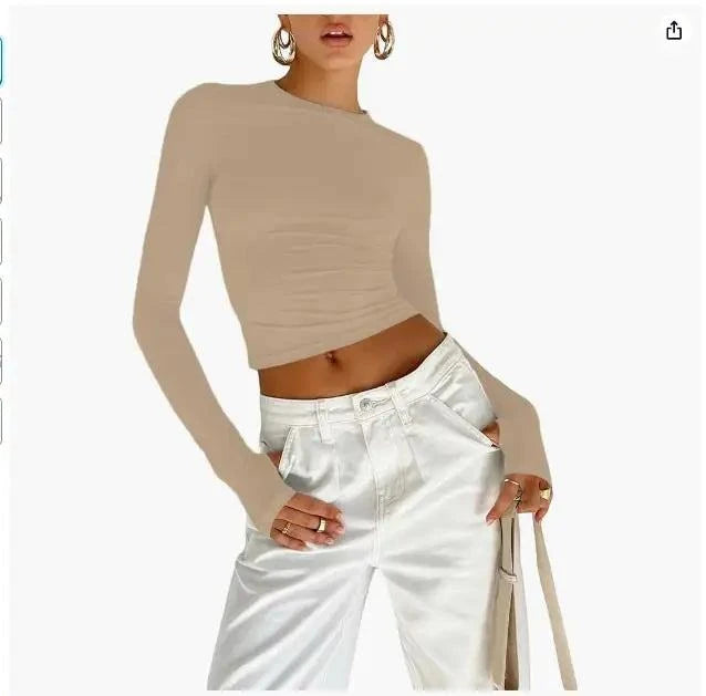 Slim Fit Long Sleeve Crop TopElevate your casual look with the Chic Long Sleeve Crew Neck Crop Top. Designed for the modern woman, this slim-fit tee features a trendy crew neck and convenient thSHOP ALL I WANTShop All I WantSlim Fit Long Sleeve Crop Top