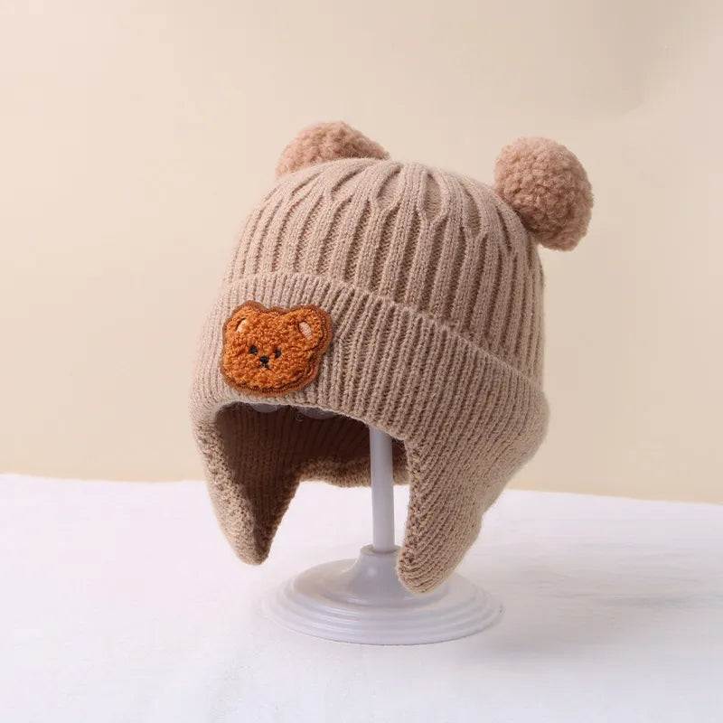 Cute Cartoon Bear Baby Beanie Cap 🐻👶The Cute Cartoon Bear Baby Beanie Cap is an adorable accessory for your little one. Here are the key specifications and details:
Design: Cartoon bear design featurSHOP ALL I WANTShop All I WantCute Cartoon Bear Baby Beanie Cap
