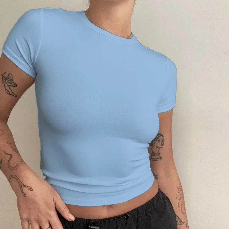 Slim Fit Sleeveless T-ShirtUpgrade your summer wardrobe with the Sporty Slim Fit Knit Tee. Perfect for everyday wear, this tee combines a classic O-neck design with medium stretch knit fabric SHOP ALL I WANTShop All I WantSlim Fit Sleeveless T-Shirt