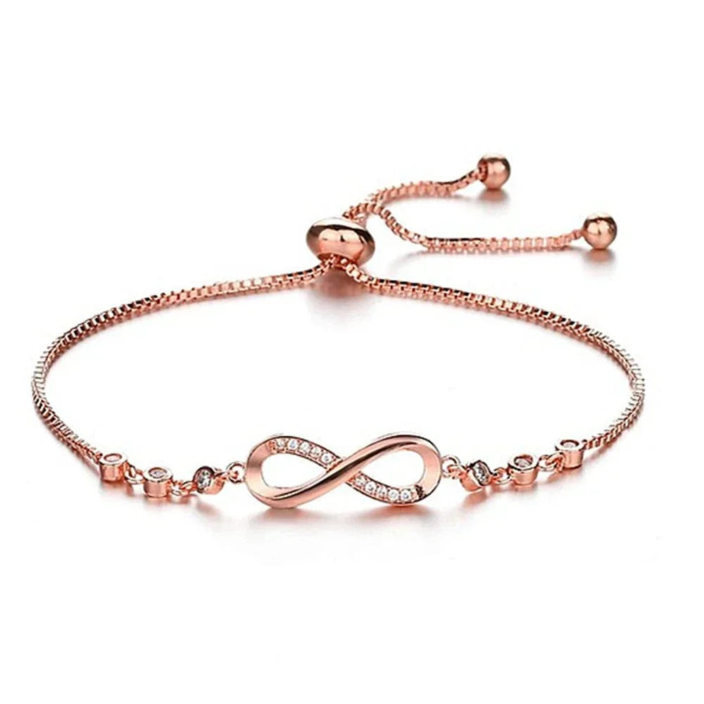 Shop All I Want Fashion Crystal Infinity Bracelet – Adjustable CZ Charm, Endless Love,Add a touch of elegance to any outfit with this Fashion Crystal Infinity Bracelet. Featuring a stunning CZ charm and an adjustable design, it's a perfect summer acceShop All I WantShop All I Wantfashion crystal infinity bracelet – elegant cz charm accessory