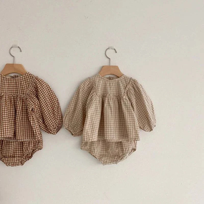 Comfy & Cute: Baby Outfits for Every Occasion! 🧸Keep your baby girl stylish and comfortable with this adorable Summer Plaid Blouse and Shorts Set. Made from 100% cotton, it's perfect for warm weather and availableSHOP ALL I WANTShop All I WantComfy & Cute Baby Outfits