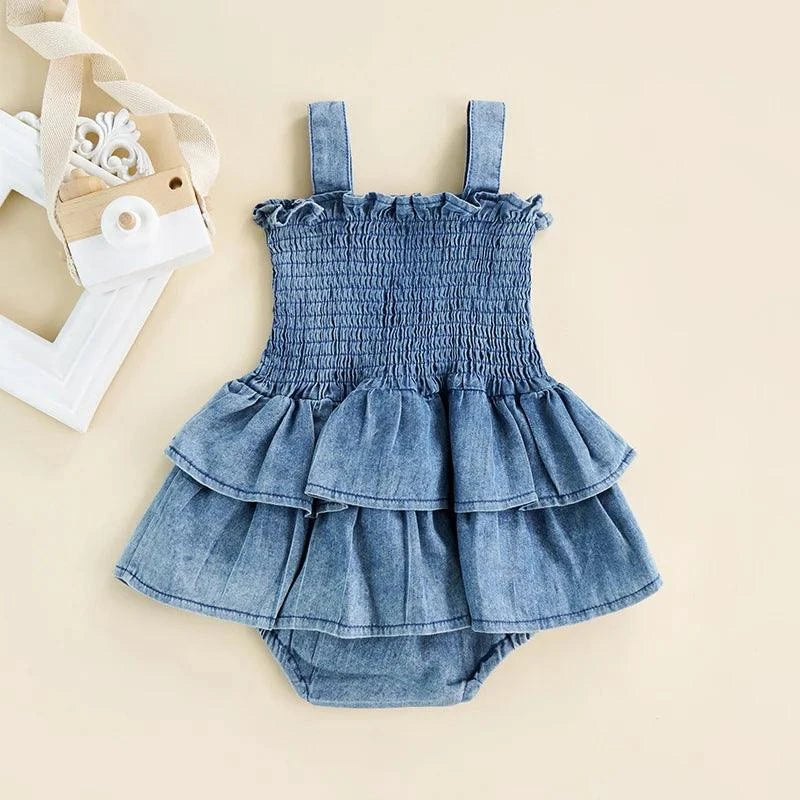Baby Summer Denim Romper – Sleeveless, Ruffle Hem, Suspender Design wiDress your little one in style with this Baby Summer Denim Romper. Featuring a sleeveless design, ruffle hem, and a suspender style with snap buttons, this cute jumpShop All I WantShop All I WantBaby Summer Denim