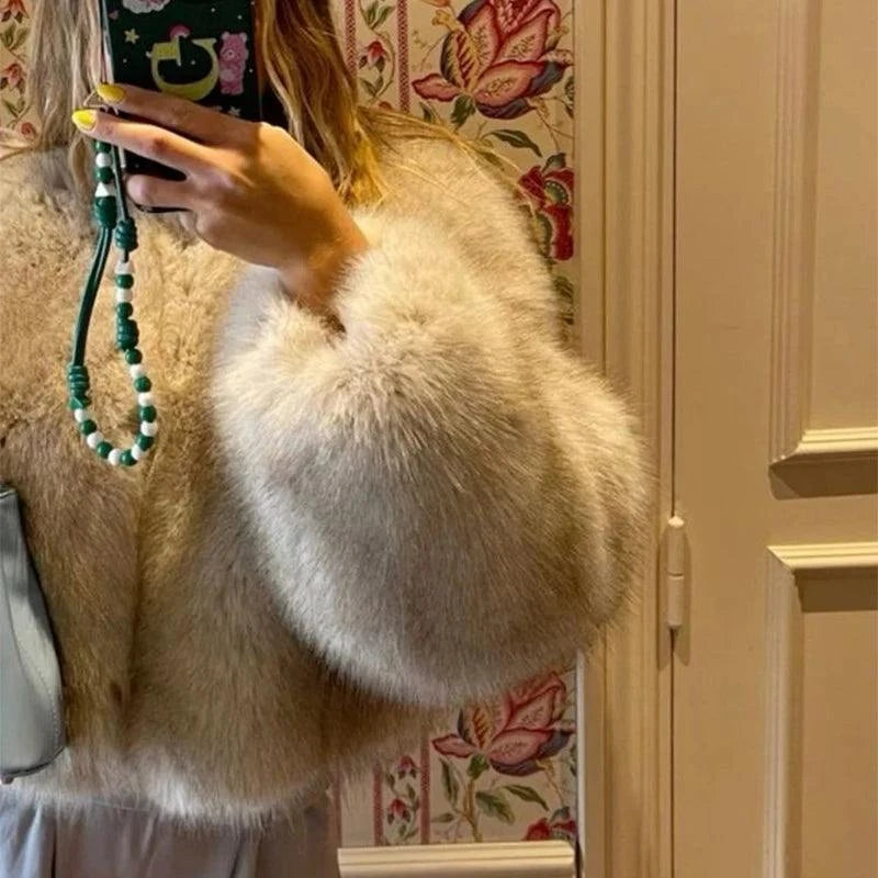 Gradient Cropped Faux Fur Coat – Iconic Street Fashion for Women, WintStep into winter with style in our Iconic Street Fashion Gradient Cropped Faux Fur Coat. This luxurious piece is designed for the cool girls who want to make a stateShop All I WantShop All I WantGradient Cropped Faux Fur Coat – Iconic Street Fashion