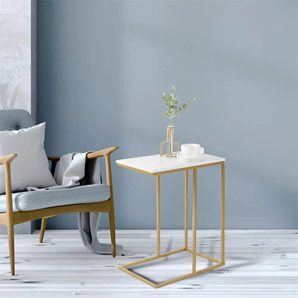 C-Shaped Side Table 🖥️Upgrade your living room or bedroom with this stylish C-Shaped Side Table. Crafted from durable sintered stone and metal iron, it features a sleek gold and white finShop All I WantShop All I Want-Shaped Side Table 🖥️