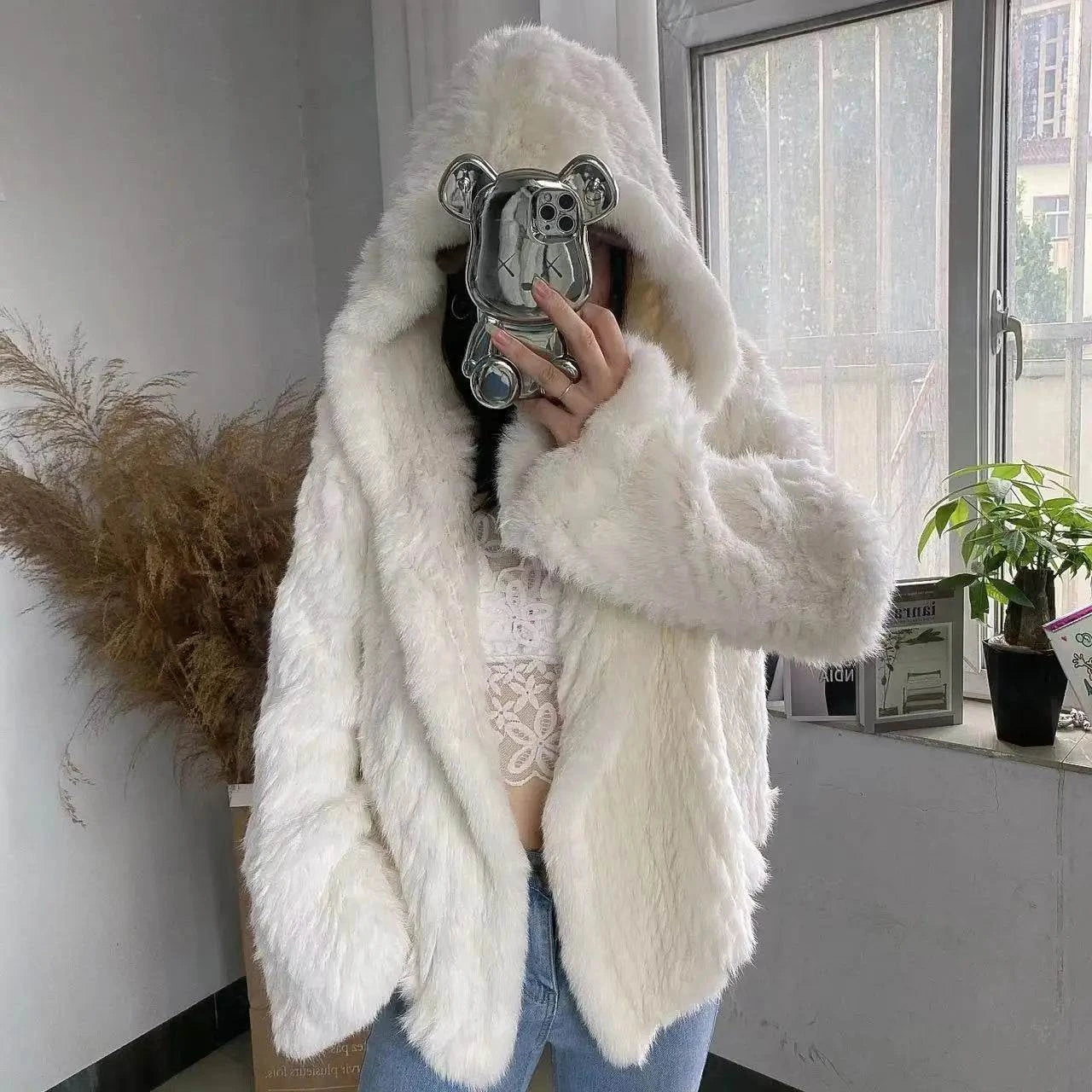 Real Rabbit Fur Coat -Miami stylish warmth 🌴Embrace winter in style with the AnnSirGra Real Rabbit Fur Coat. Featuring 100% genuine rabbit fur with a chic flare sleeve and hood, this coat combines warmth with SHOP ALL I WANTShop All I WantReal Rabbit Fur Coat