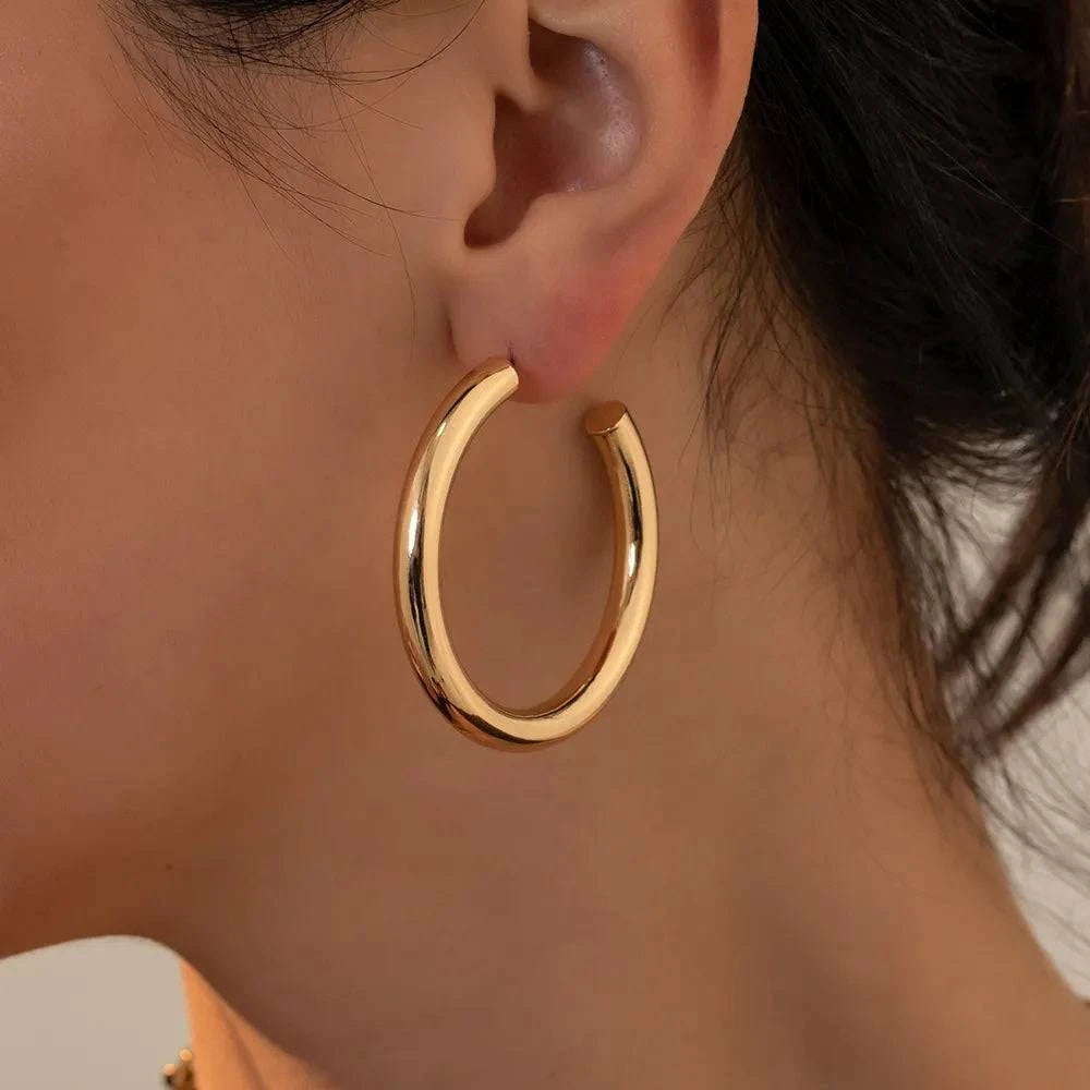 Oversize Gold Hoop Earring ππ« #PunkJewelryMake a bold and rebellious statement with our Oversize Gold Hoop Earring β a striking piece that embodies the essence of #PunkJewelry. These earrings are designed toSHOP ALL I WANTShop All I WantOversize Gold Hoop Earring