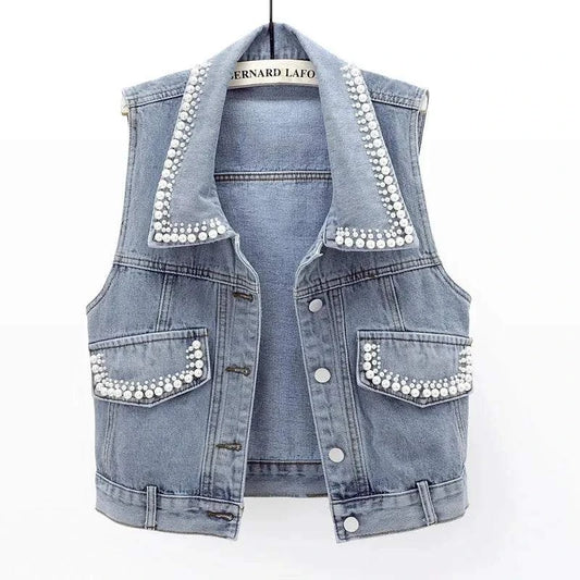 Women's Slim Denim Waistcoat – Beaded Pearls Spring Vibes ✨👖This Women's Slim Denim Waistcoat with pearl beaded detailing is a must-have for your Spring/Summer 2024 wardrobe. Combining timeless denim with intricate pearls, thShop All I WantShop All I WantSlim Denim Waistcoat – Beaded Pearls Spring Vibes ✨👖