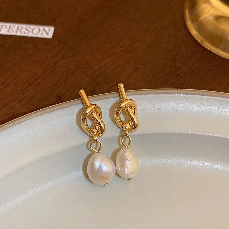 French Gold Pearl Earrings ๐ธ #KoreanFashionIntroducing our French Gold Pearl Earrings โ a harmonious blend of French sophistication and Korean fashion finesse. These earrings transcend cultural boundaries, ofSHOP ALL I WANTShop All I WantFrench Gold Pearl Earrings