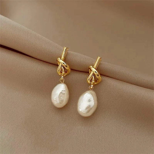 French Gold Pearl Earrings 🌸 #KoreanFashionIntroducing our French Gold Pearl Earrings – a harmonious blend of French sophistication and Korean fashion finesse. These earrings transcend cultural boundaries, ofSHOP ALL I WANTShop All I WantFrench Gold Pearl Earrings