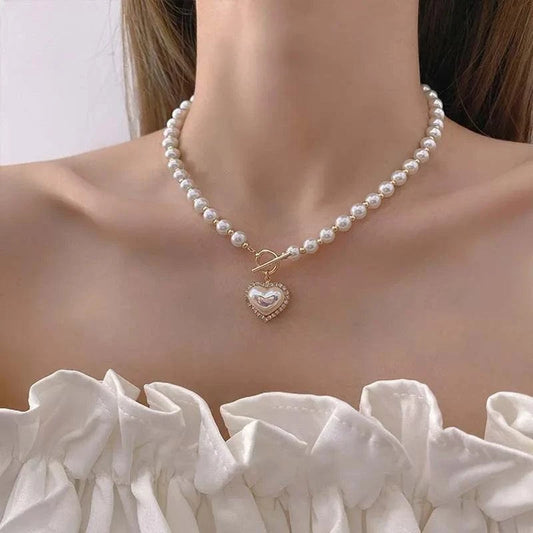 Heart Shaped Pearl Necklace 💖🦋Elevate your style with our Heart-Shaped Pearl Necklace - a symbol of love and sophistication that adds a touch of elegance to your look. 💖🦋🌟
Key Features:
💖 ExqSHOP ALL I WANTShop All I WantHeart Shaped Pearl Necklace
