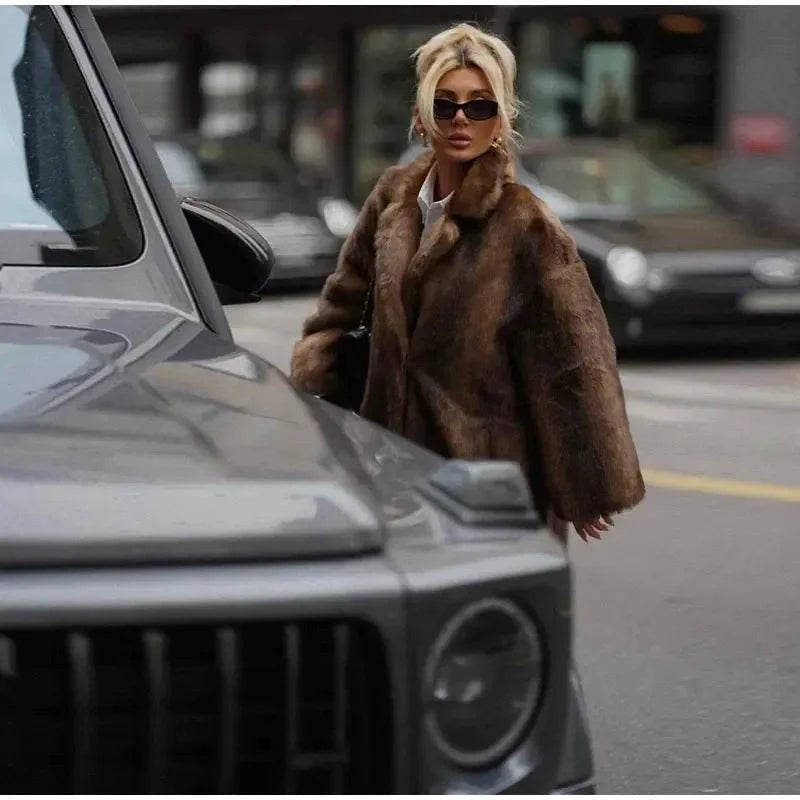 Women’s Dark Brown Faux Fur Overcoat: Plush & Warm Trench! ❄️🧥Stay cozy and stylish this winter with our women's dark brown faux fur long overcoat. This single-breasted fleece trench coat combines luxury and warmth, featuring aShop All I WantShop All I WantWomen’s Dark