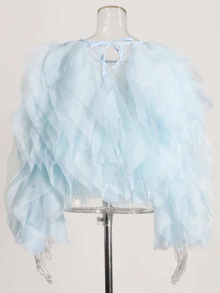 Ruffled Lantern Sleeve Blouse -Venice: Summer chic 🏖️Step into summer elegance with this Ruffled Lantern Sleeve Blouse. Perfect for a sunny Venice day, it features a lightweight chiffon fabric with a stylish patchwork SHOP ALL I WANTShop All I WantRuffled Lantern Sleeve Blouse