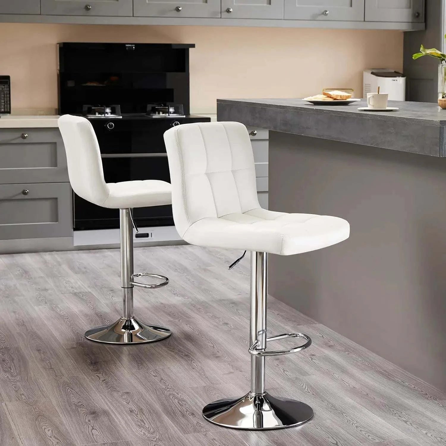 Bar Stools Set of 4, 24-inch Counter Height, PU Leather Saddle UpholstElevate your dining or kitchen space with this sleek set of four bar stools. Designed for comfort and style, the 24-inch counter height stools feature a PU leather sShop All I WantShop All I WantBar Stools Set