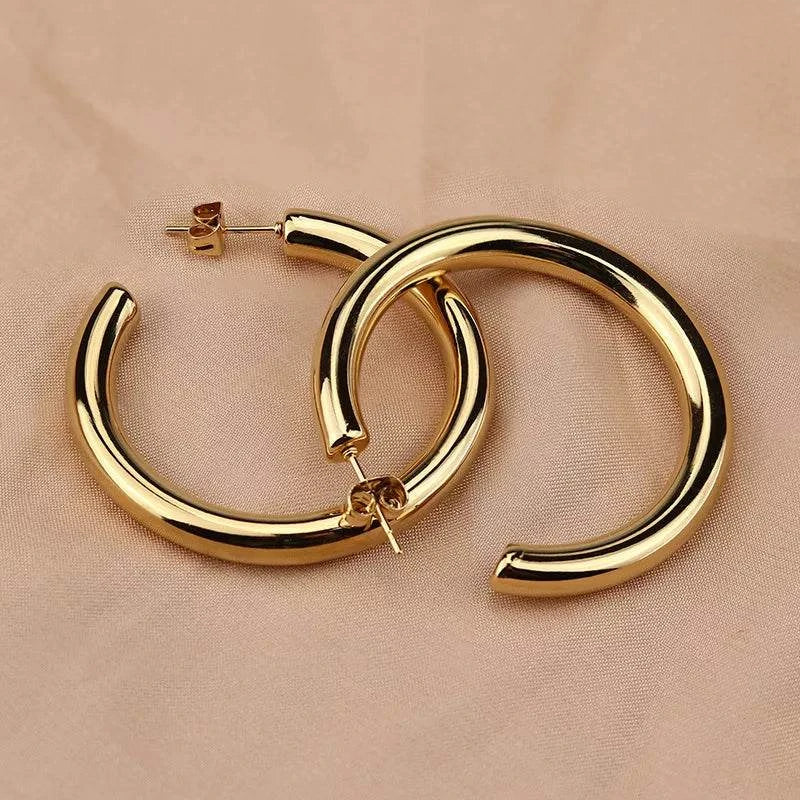 Oversize Gold Hoop Earring ππ« #PunkJewelryMake a bold and rebellious statement with our Oversize Gold Hoop Earring β a striking piece that embodies the essence of #PunkJewelry. These earrings are designed toSHOP ALL I WANTShop All I WantOversize Gold Hoop Earring