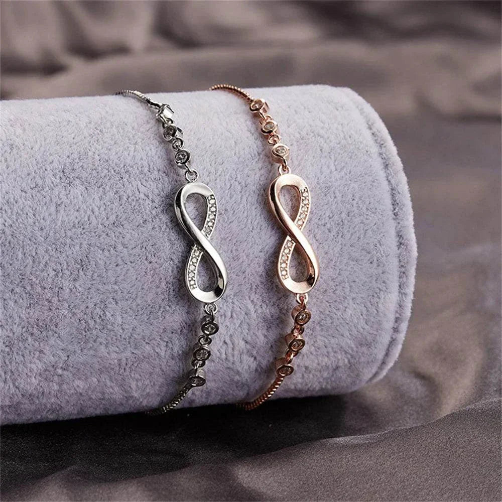 Shop All I Want Fashion Crystal Infinity Bracelet – Adjustable CZ Charm, Endless Love,Add a touch of elegance to any outfit with this Fashion Crystal Infinity Bracelet. Featuring a stunning CZ charm and an adjustable design, it's a perfect summer acceShop All I WantShop All I Wantfashion crystal infinity bracelet – elegant cz charm accessory