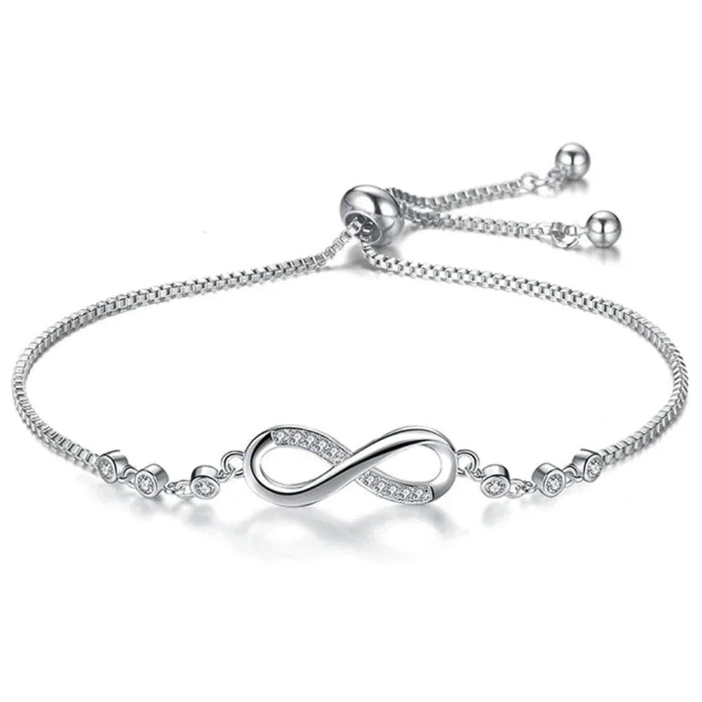 Shop All I Want Fashion Crystal Infinity Bracelet – Adjustable CZ Charm, Endless Love,Add a touch of elegance to any outfit with this Fashion Crystal Infinity Bracelet. Featuring a stunning CZ charm and an adjustable design, it's a perfect summer acceShop All I WantShop All I Wantfashion crystal infinity bracelet – elegant cz charm accessory