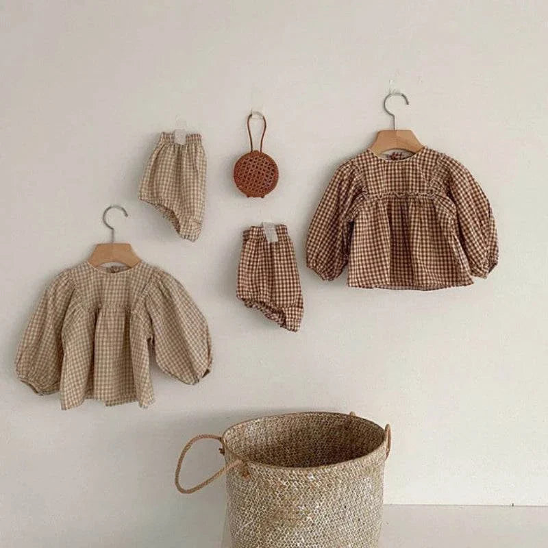 Comfy & Cute: Baby Outfits for Every Occasion! 🧸Keep your baby girl stylish and comfortable with this adorable Summer Plaid Blouse and Shorts Set. Made from 100% cotton, it's perfect for warm weather and availableSHOP ALL I WANTShop All I WantComfy & Cute Baby Outfits