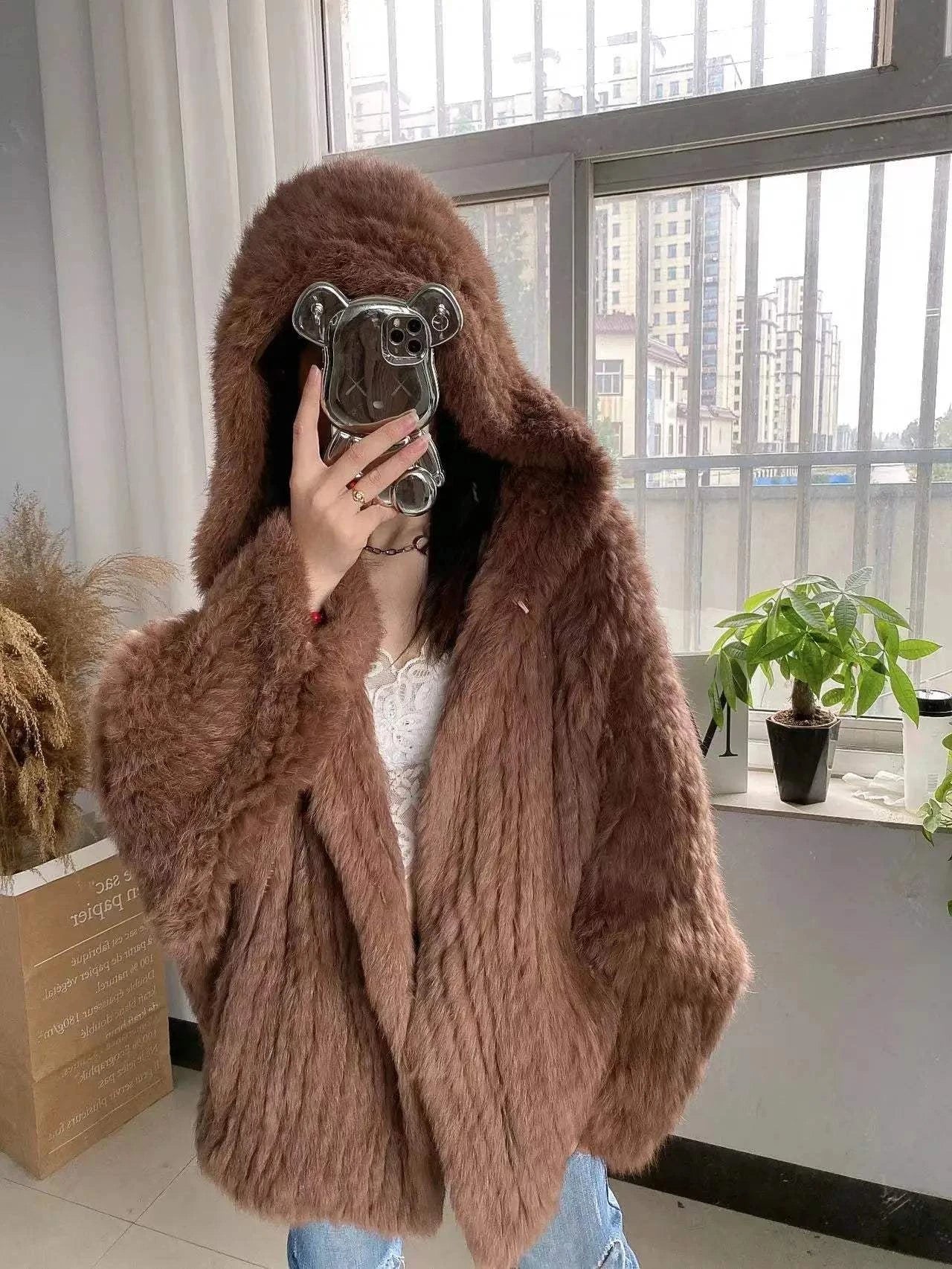 Real Rabbit Fur Coat -Miami stylish warmth 🌴Embrace winter in style with the AnnSirGra Real Rabbit Fur Coat. Featuring 100% genuine rabbit fur with a chic flare sleeve and hood, this coat combines warmth with SHOP ALL I WANTShop All I WantReal Rabbit Fur Coat