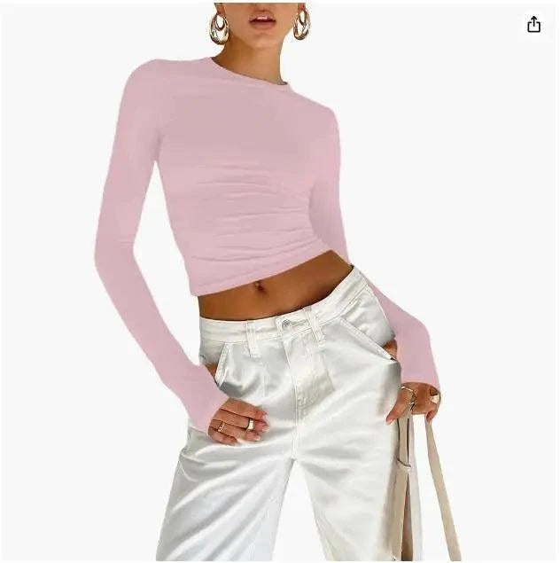 Slim Fit Long Sleeve Crop TopElevate your casual look with the Chic Long Sleeve Crew Neck Crop Top. Designed for the modern woman, this slim-fit tee features a trendy crew neck and convenient thSHOP ALL I WANTShop All I WantSlim Fit Long Sleeve Crop Top