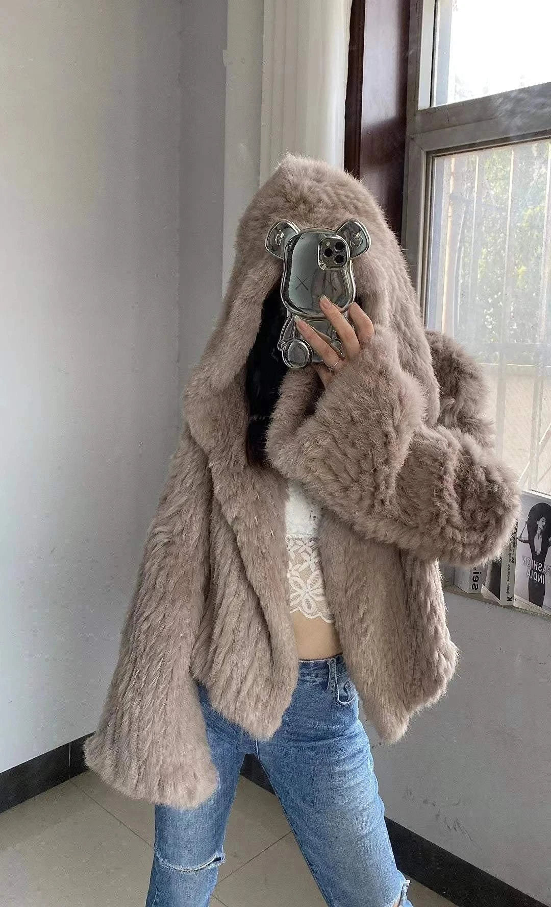 Real Rabbit Fur Coat -Miami stylish warmth 🌴Embrace winter in style with the AnnSirGra Real Rabbit Fur Coat. Featuring 100% genuine rabbit fur with a chic flare sleeve and hood, this coat combines warmth with SHOP ALL I WANTShop All I WantReal Rabbit Fur Coat