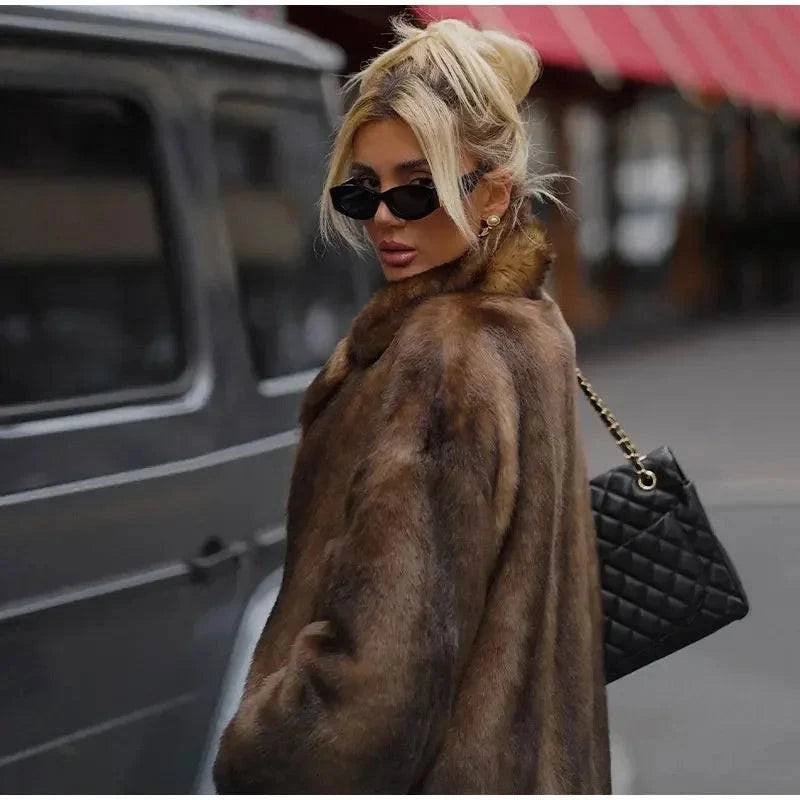 Women’s Dark Brown Faux Fur Overcoat: Plush & Warm Trench! ❄️🧥Stay cozy and stylish this winter with our women's dark brown faux fur long overcoat. This single-breasted fleece trench coat combines luxury and warmth, featuring aShop All I WantShop All I WantWomen’s Dark