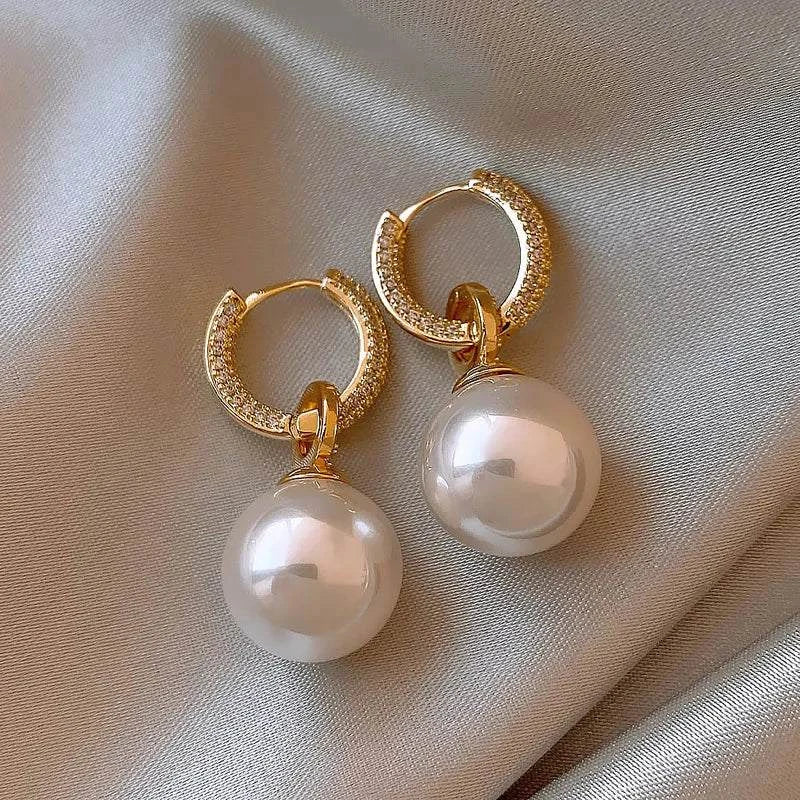 Pearl & Zircon Earrings πππElevate your elegance with these stunning Pearl & Zircon Earrings. ππ
π Timeless Glamour: Perfect for any occasion. π Lustrous Pearls: Exude sophistication aSHOP ALL I WANTShop All I WantPearl & Zircon Earrings