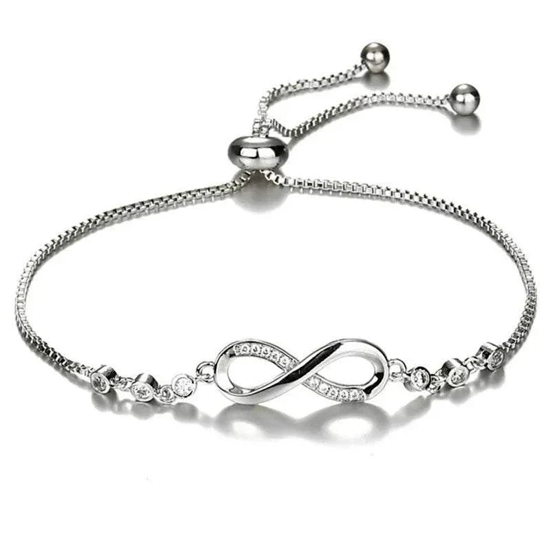 Shop All I Want Fashion Crystal Infinity Bracelet – Adjustable CZ Charm, Endless Love,Add a touch of elegance to any outfit with this Fashion Crystal Infinity Bracelet. Featuring a stunning CZ charm and an adjustable design, it's a perfect summer acceShop All I WantShop All I Wantfashion crystal infinity bracelet – elegant cz charm accessory