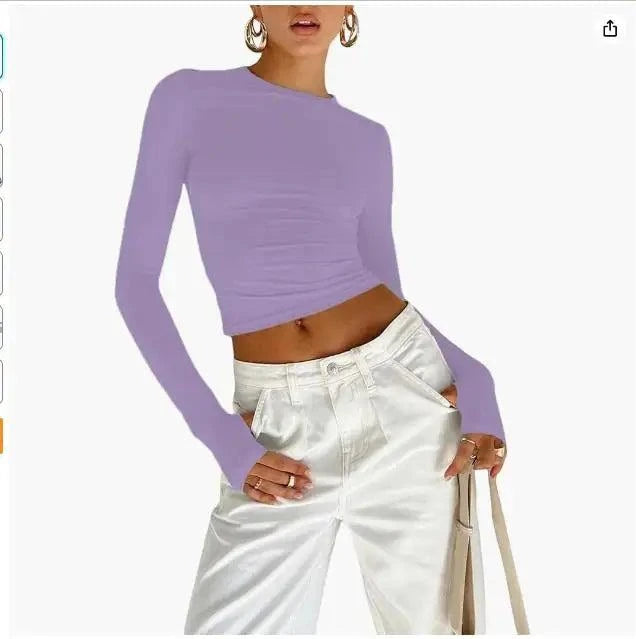 Slim Fit Long Sleeve Crop TopElevate your casual look with the Chic Long Sleeve Crew Neck Crop Top. Designed for the modern woman, this slim-fit tee features a trendy crew neck and convenient thSHOP ALL I WANTShop All I WantSlim Fit Long Sleeve Crop Top
