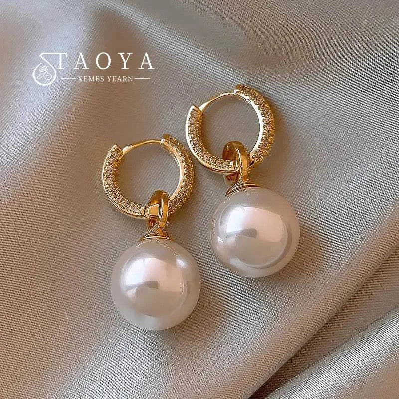 Pearl & Zircon Earrings πππElevate your elegance with these stunning Pearl & Zircon Earrings. ππ
π Timeless Glamour: Perfect for any occasion. π Lustrous Pearls: Exude sophistication aSHOP ALL I WANTShop All I WantPearl & Zircon Earrings