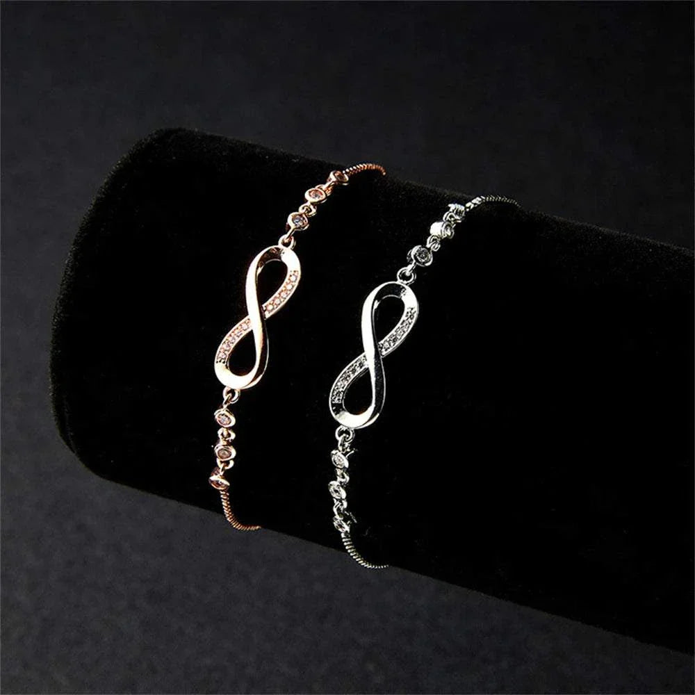 Shop All I Want Fashion Crystal Infinity Bracelet – Adjustable CZ Charm, Endless Love,Add a touch of elegance to any outfit with this Fashion Crystal Infinity Bracelet. Featuring a stunning CZ charm and an adjustable design, it's a perfect summer acceShop All I WantShop All I Wantfashion crystal infinity bracelet – elegant cz charm accessory
