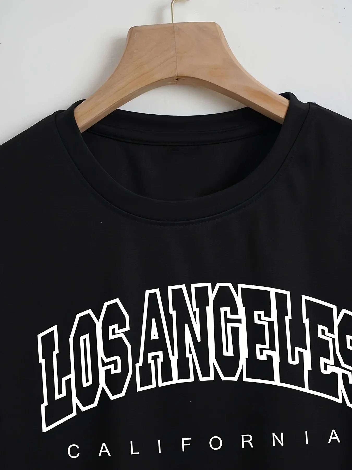Casual Short Sleeve Los Angeles T-shirtShowcase your LA style with this casual short sleeve tee! Perfect for a relaxed, urban look that captures the essence of Los Angeles. 🌆👕SHOP ALL I WANTShop All I WantCasual Short Sleeve