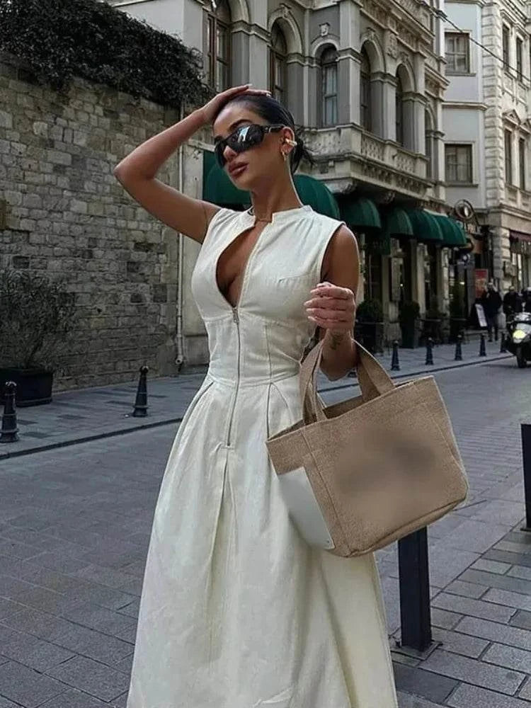 Sleeveless High Waist Maxi DressStep into summer with effortless elegance in the Chic V-Neck Sleeveless Maxi Dress. This stunning ankle-length dress features a flattering A-line silhouette with a VSHOP ALL I WANTShop All I WantSleeveless High Waist Maxi Dress