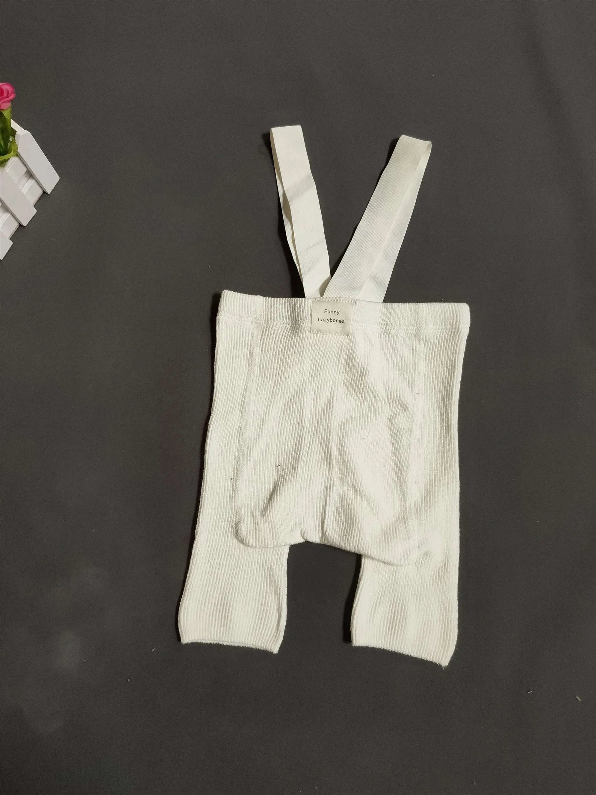 Baby Suspender Shorts – High Waist, Spanish Style, Tight-Fitting, TrenDress your little one in fashion-forward comfort with these Baby Suspender Shorts. Featuring a high waist and Spanish style, these tight-fitting leggings are perfectShop All I WantShop All I WantBaby Suspender Shorts